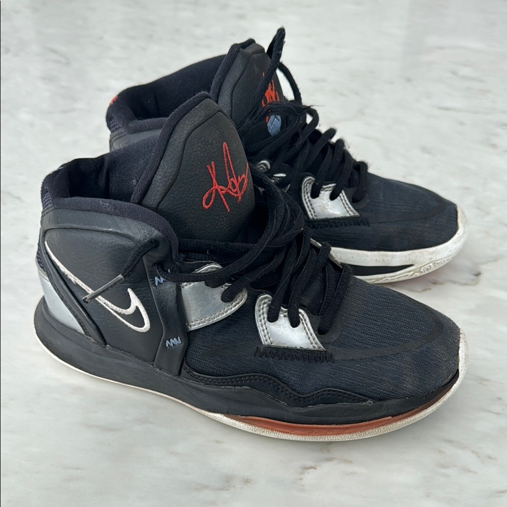 Nike Black and Silver Athletic Shoes with High-Top Design